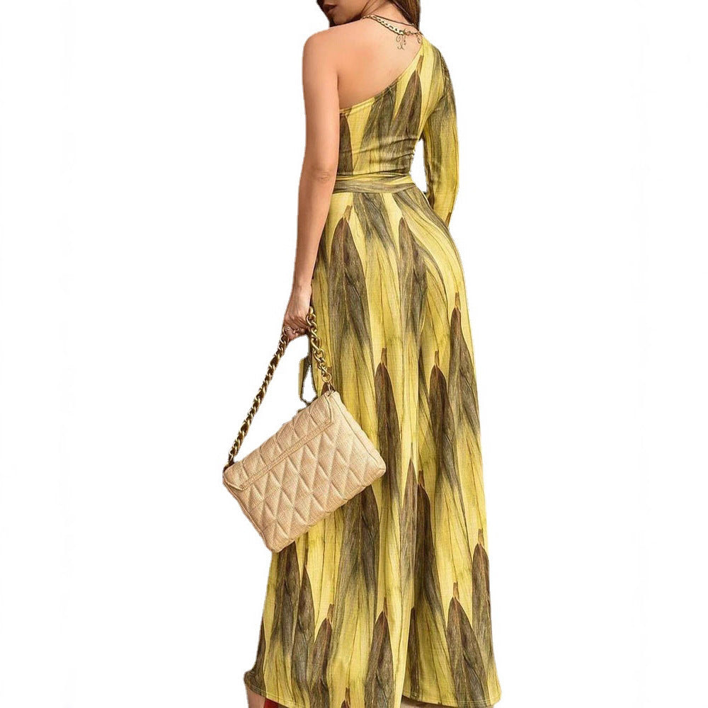 Kvinders elegante jumpsuit med asymmetrisk snit og blomstret print