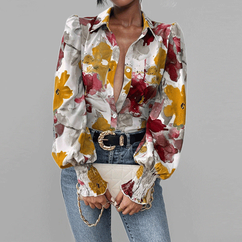 Damebluse med blomstertrykt og puffærmer Stilla