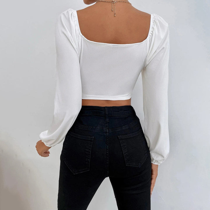 Kvindernes cropped top med stilfuldt pufærme-design og tætsiddende silhuet Stilla