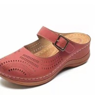Dame Clogs med dekorativt gennembrudsdesign og justerbar rem Stilla