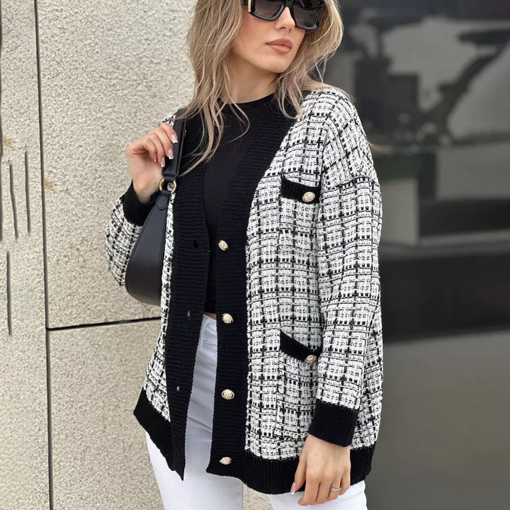 Kvinders bouclé cardigan med elegante knapdetaljer Stilla
