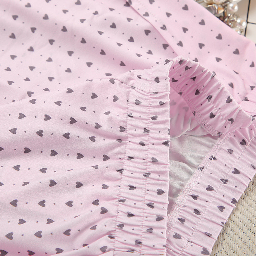 Dame kortærmet pyjamasæt med hjerte-motiv og elastisk talje Stilla