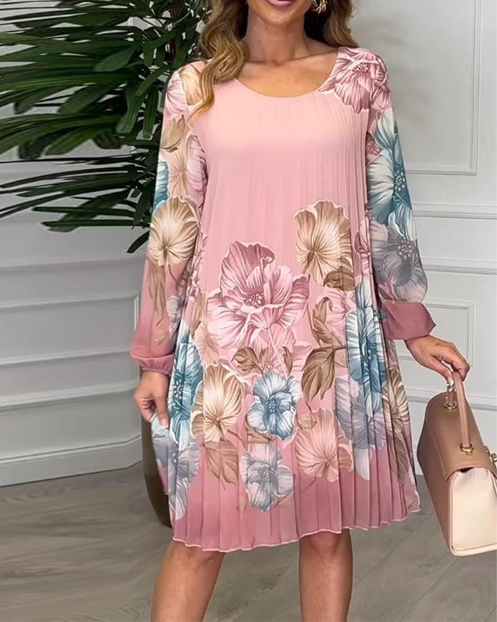 Dame knælang plisseret chiffonkjole med blomsterprint, gennemsigtige ærmer og rund halsudskæring Skovae