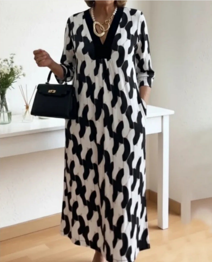 Kvindernes casual maxi kjole med elegant V-hals og praktiske sidelommer Stilla