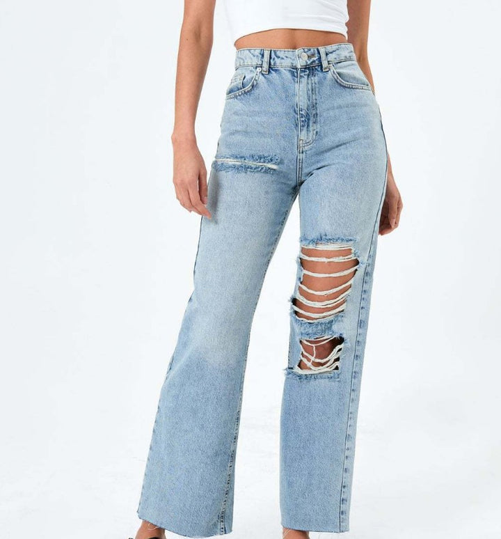 Dame High-Waist Jeans med fashionabelt Destroyed-elementer Stilla
