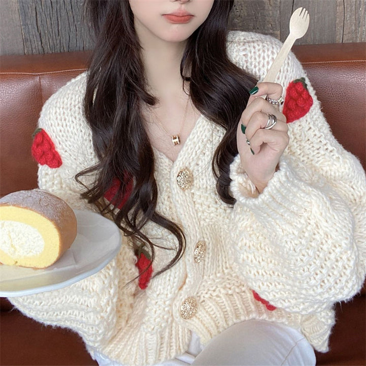 Kvinders chunky strikket cardigan med dejlige blomsterapplikationer og guldknapper Stilla