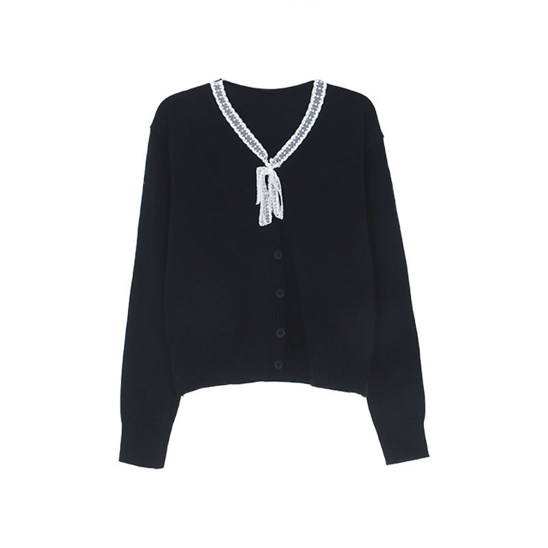 Dame afslappet cardigan med fin ribstrik og dekorativ snorebinding Stilla