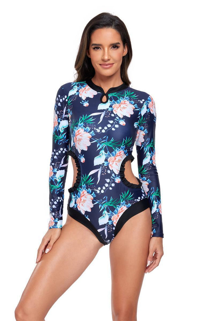 Dame elegant one-piece surfedragt med blomstermønster og cut-out-detaljer Stilla