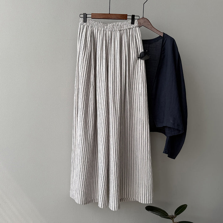 Dame maxiskirts lavet af let, åndbart materiale med elegant plissering Stilla