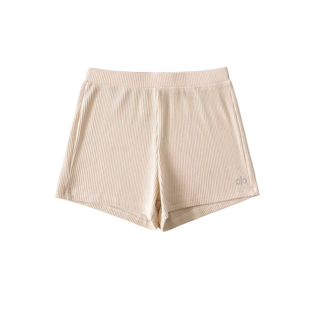 Dame funktionsshorts i moderne ribdesign med elastisk bund og praktiske sidelommer Stilla