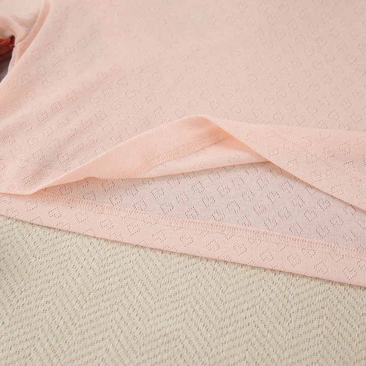 Dame hyggeligt pyjamasæt med crop-formet overdel og elastisk buks Stilla