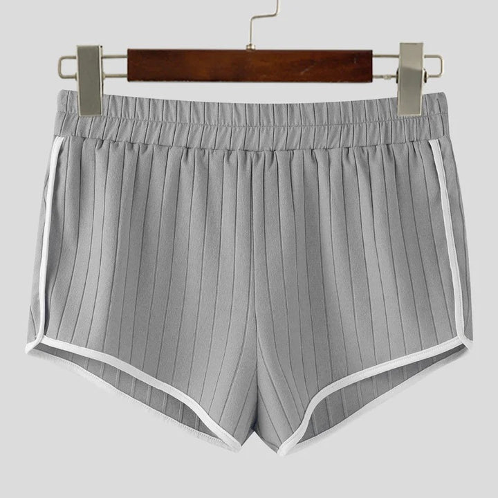 Dame nan plisserede fritidsshorts med elastisk komforttalje og kontrastpiping Skovae