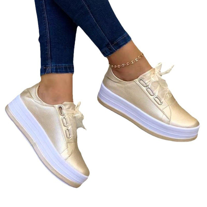 Dame Sneakers med flad sål og elegant metallic overflade Stilla