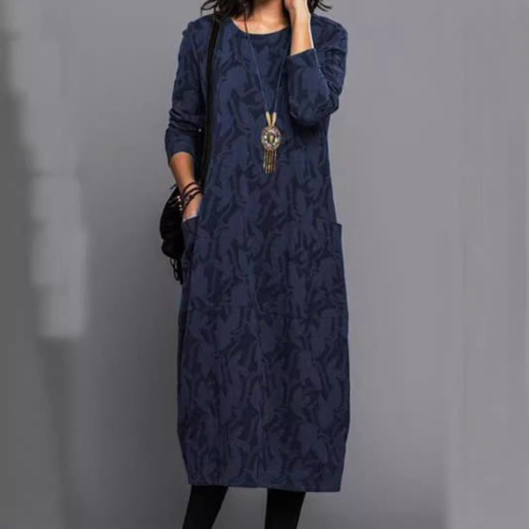 Dame nan locker skåret Midikjole lavet af finstrik med tone-i-tone Jacquard, rund halsudskæring og sidelommer Skovae