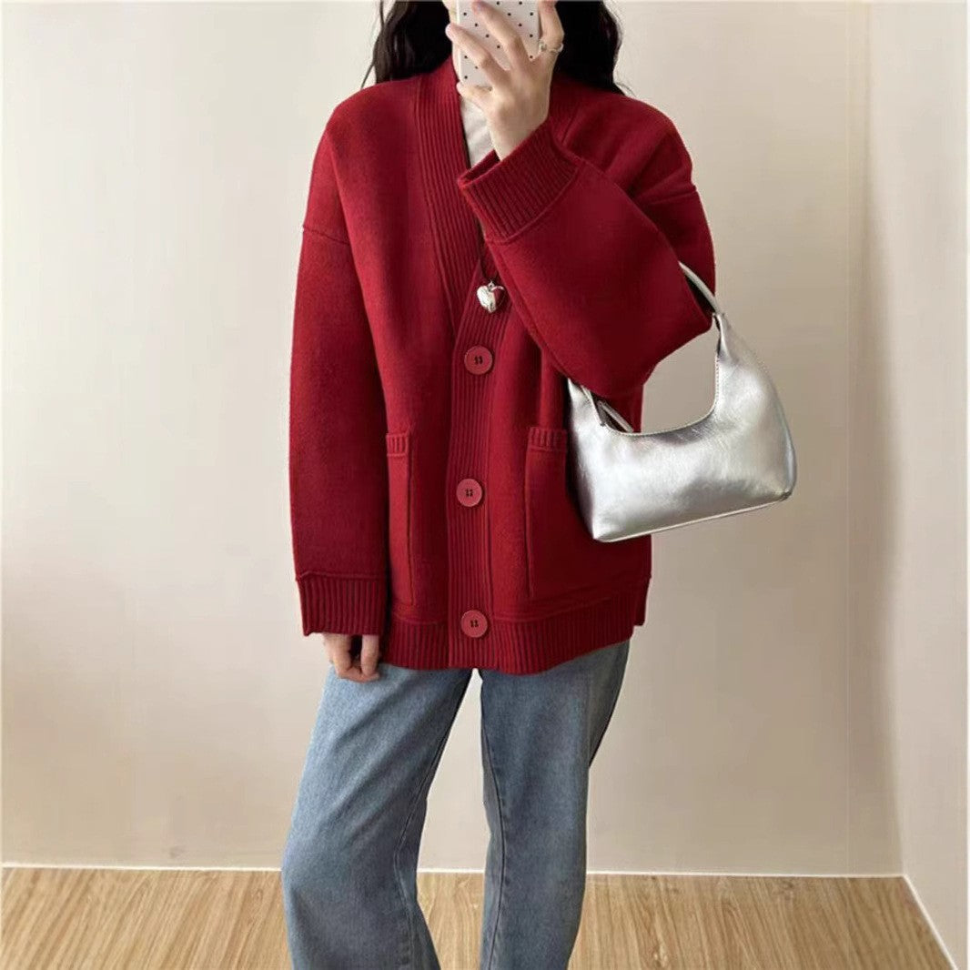 Dame cardigan med dyb V-hals og praktiske lommer Stilla
