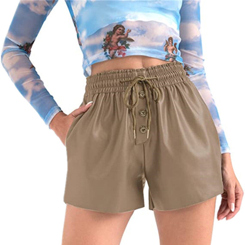 Dame Mode Kort shorts med elastisk talje og knapdetaljer Stilla
