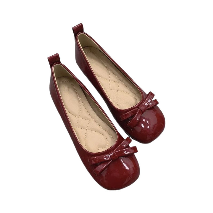 Dame ballerinas med elegant sløjfedekoration og blank overflade Stilla