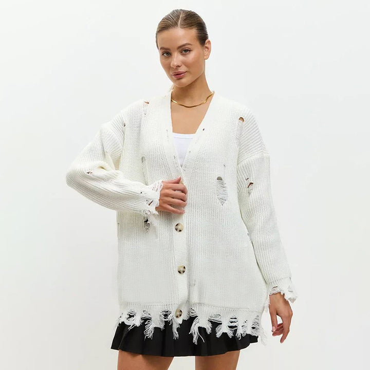 Dame oversized strikpullover med frynset detaljer og afslappet struktur Stilla