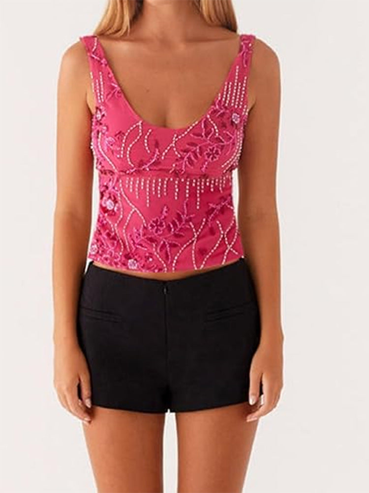 Dame couture top med floral rhinestone design og tætsiddende snit