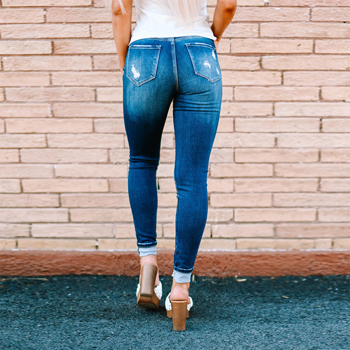 Dame High-Waist Skinny Jeans med moderne destroyed-detaljer og knaplukning Stilla