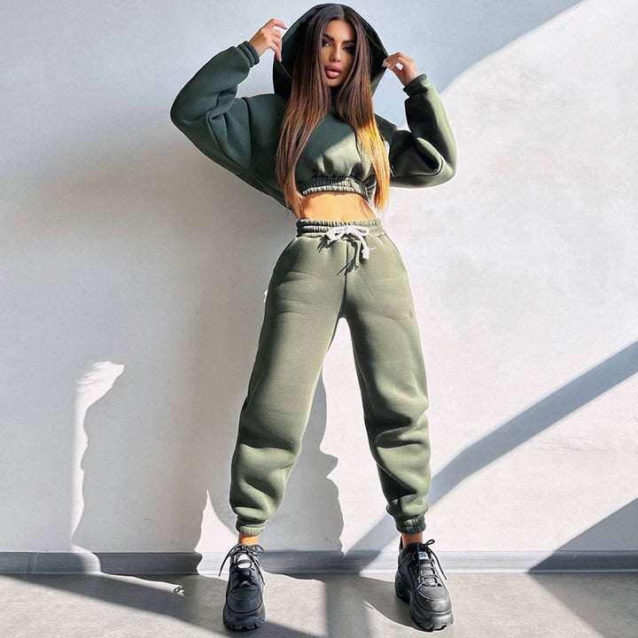 Kvinders sporty cropped sweat sæt med elastisk talje og praktiske lommer