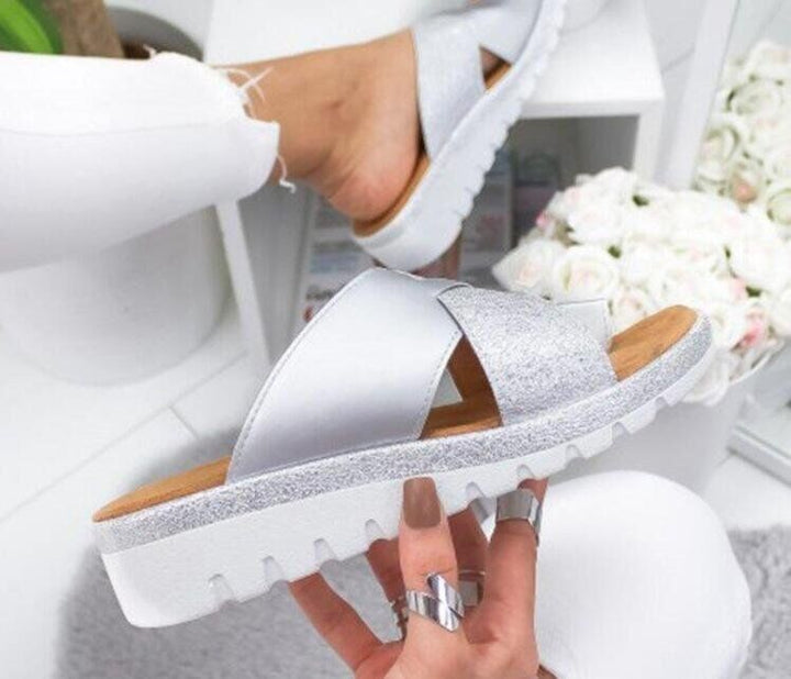 Dame moderigtige slippers med glitrende accenter og skridsikker sål Stilla