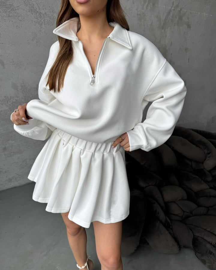 Dame sporty oversized pullover med kort lynlås og ribbede detaljer Skovae