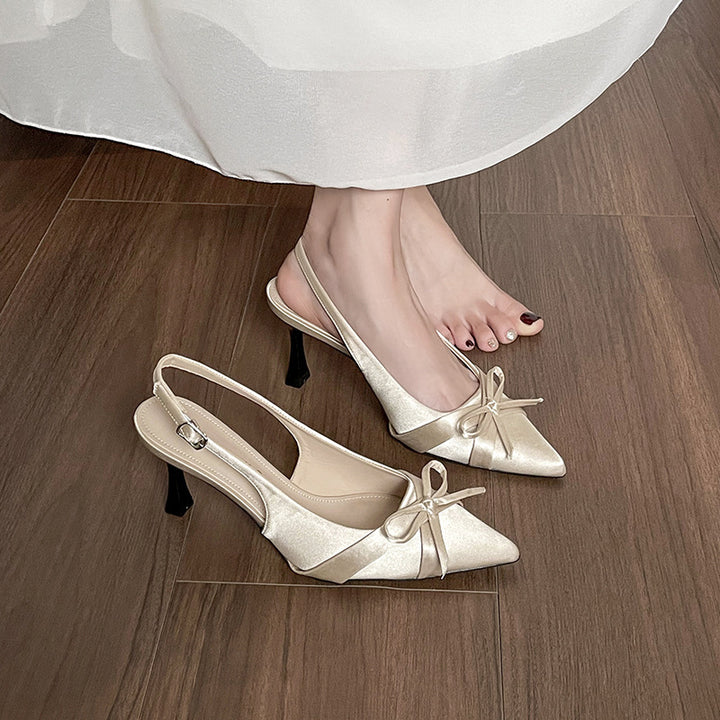 Dame Sling-Pumps med elegant sløjfedekoration og modeglans Stilla