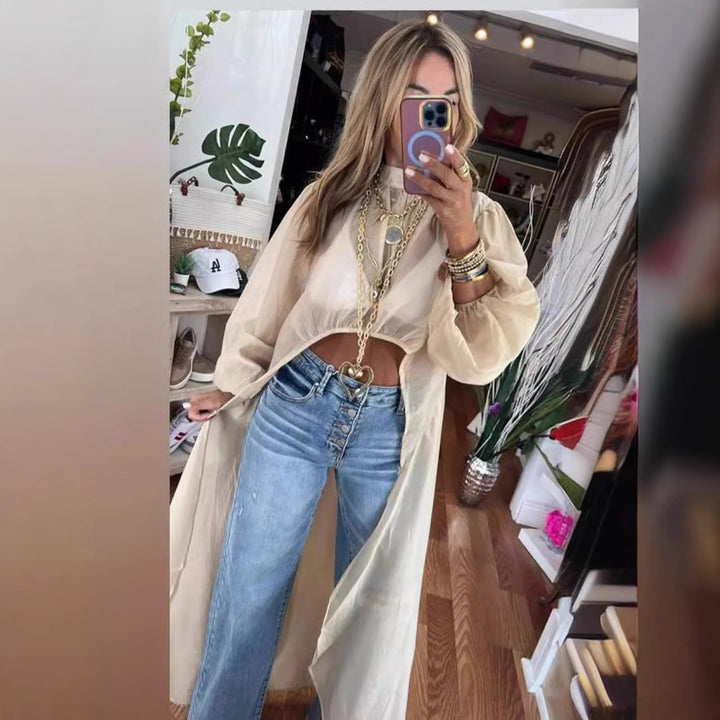 Dame transparent Longbluse med raffinerede pufærmer og elegant snit Stilla