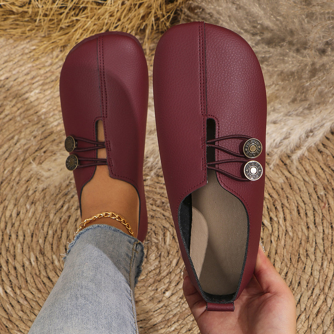 Dame Slip-On sko med moderigtigt knapdetalje og blødt overmateriale Stilla