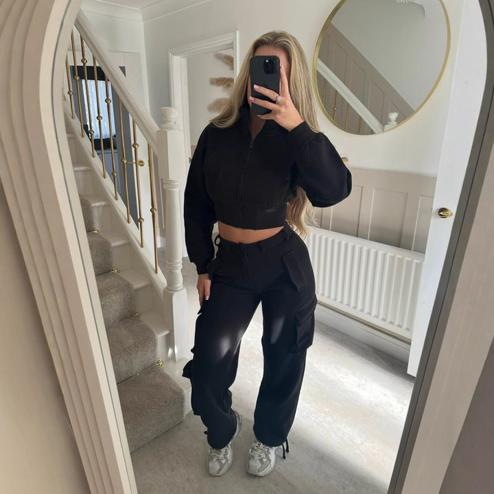 Kvinders fashionable cropped fritids sæt med funktionel lynlås og praktiske lommer