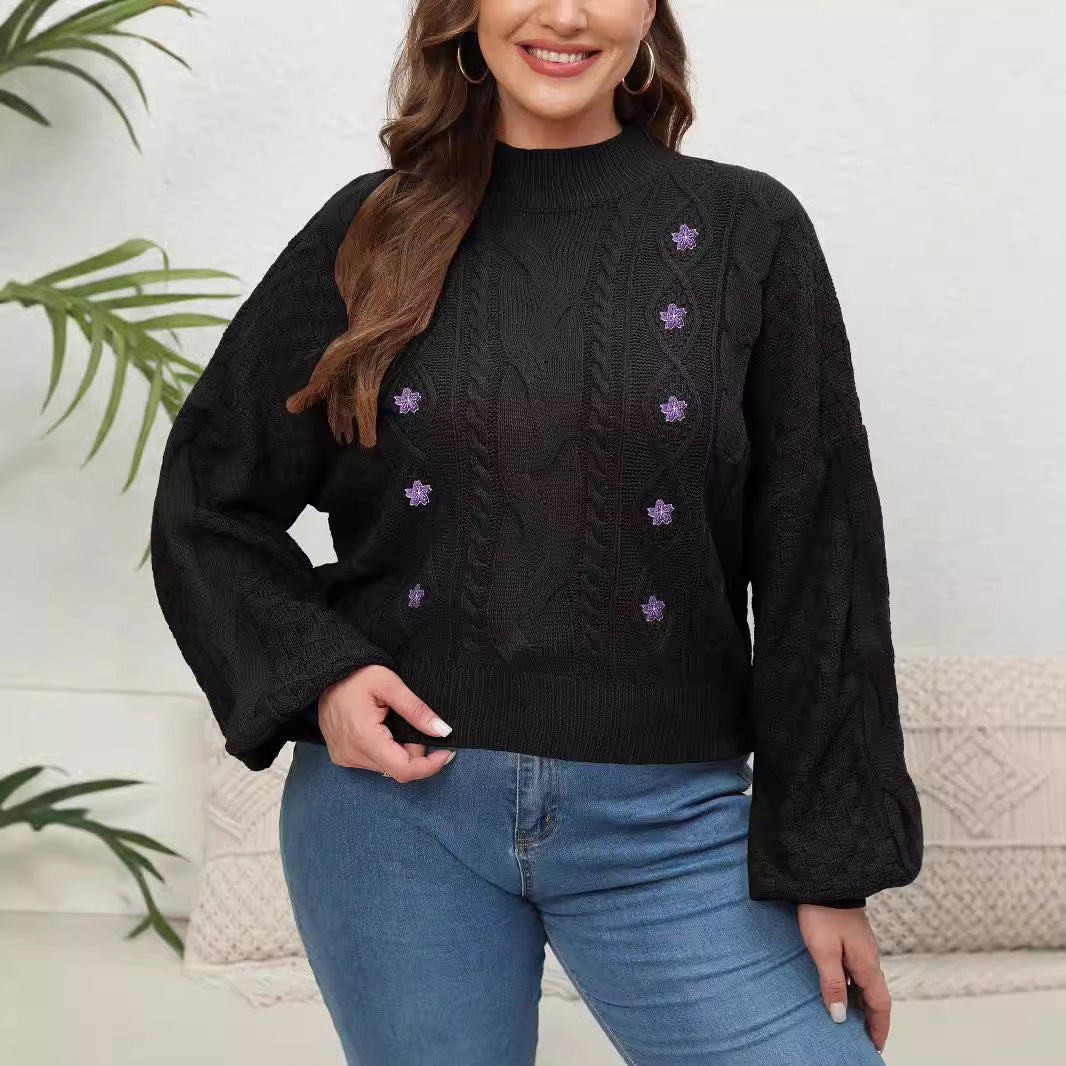 Dame strikkepullover med floralt broderi og afslappet snit Stilla