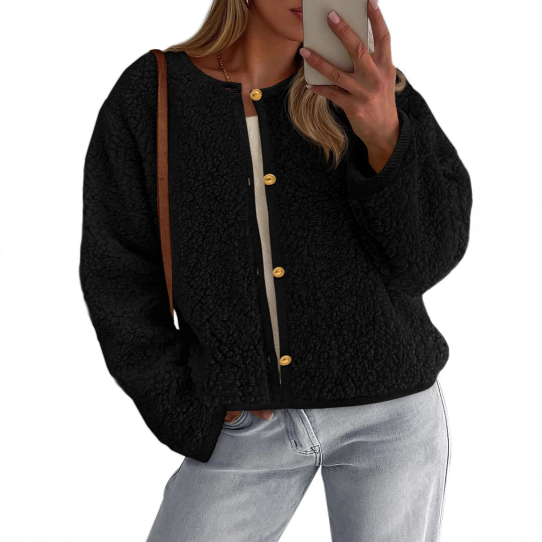 Kvinders hyggelige fleecejakke med knapdetalje og oversized snit Stilla