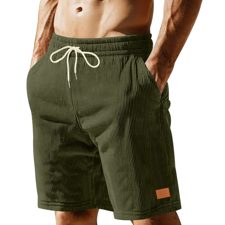 Herrer nan casual Bermuda shorts lavet af fint struktureret bomuldsblanding med elastisk talje og snor.