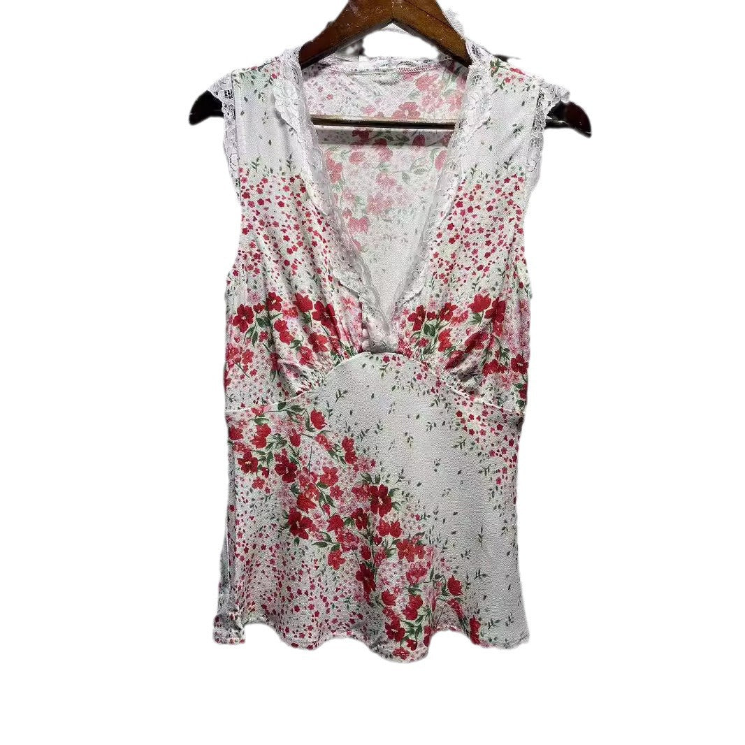 Damebluse med romantiske spids- og blomsterdesigns Stilla