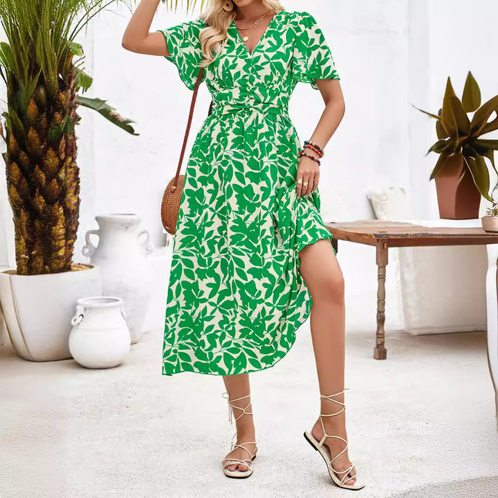 Dame maxikjole med blomstret print og figursyet design Stilla
