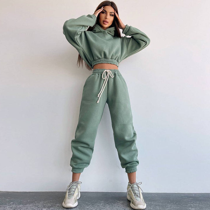Kvinders sporty cropped sweat sæt med elastisk talje og praktiske lommer