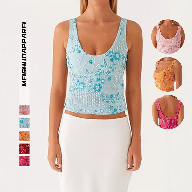 Dame couture top med floral rhinestone design og tætsiddende snit