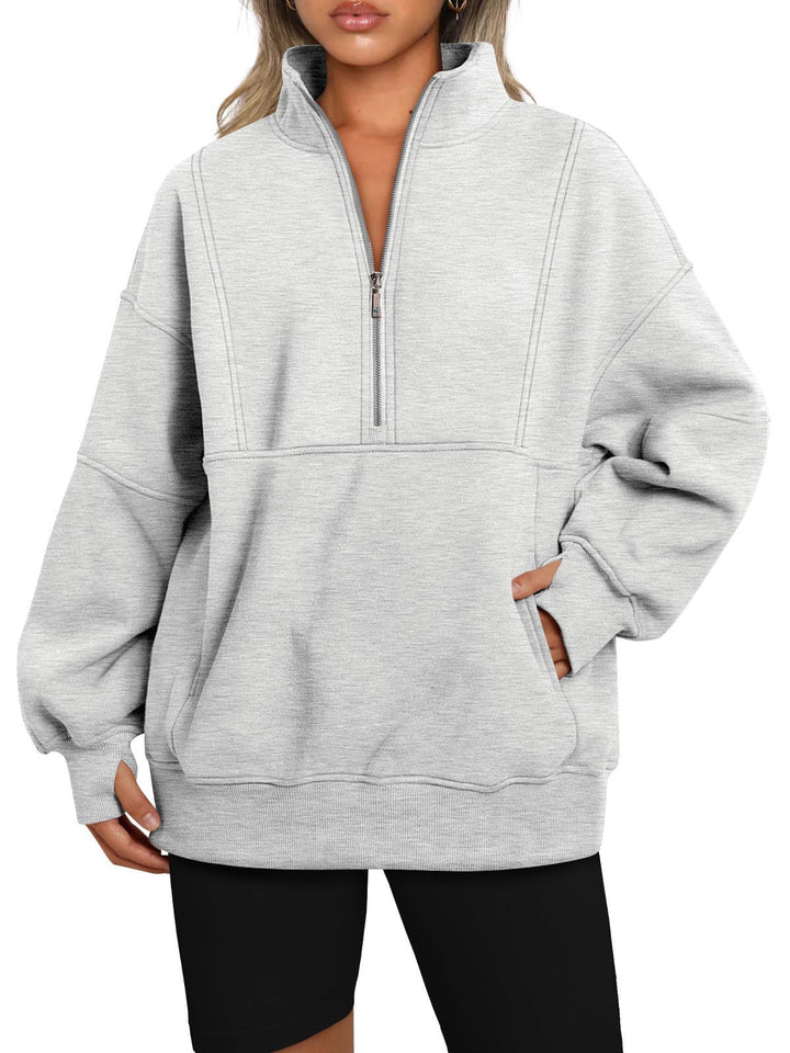 Dame Sporty Hoodie med halvdelen lynlås og voluminøse ærmer Stilla