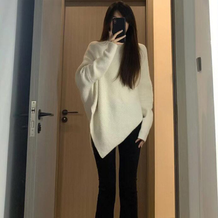 Kvinders oversized strikpullover med asymmetrisk snit og fin ribstruktur Stilla