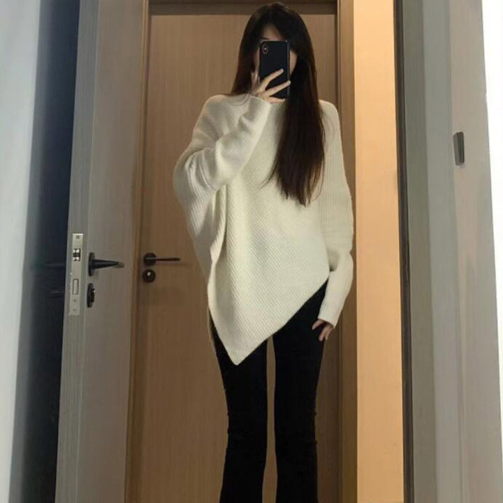 Kvinders oversized strikpullover med asymmetrisk snit og fin ribstruktur Stilla