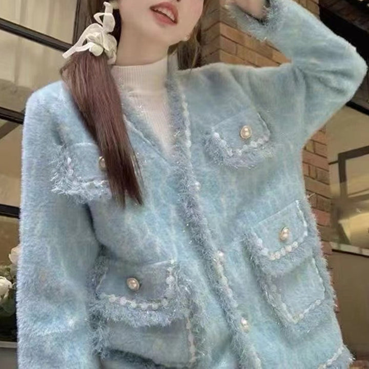 Kvinders fluffy cardigan med elegante knapdetaljer og dekorativ kant Stilla