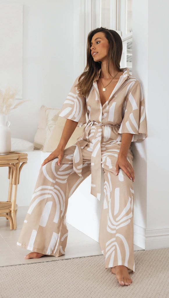 Kvinders jumpsuit med elegant bælte og stilfuldt mønster Stilla