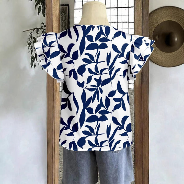 Damebluse med pufærmer og blomsteret mønster Skovae