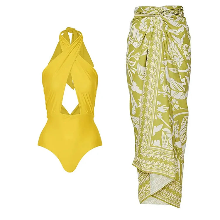 Dame one-piece badedragt med asymmetrisk indpakningsdesign og spændende cut-out Skovae