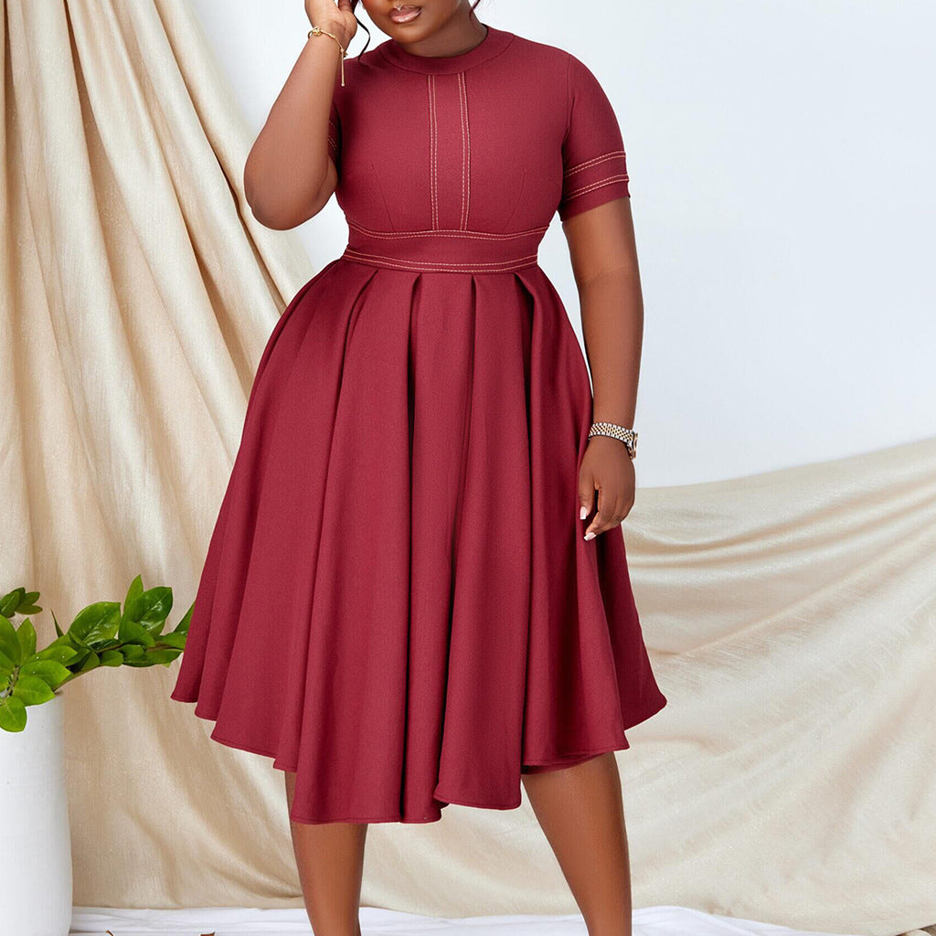 Dame midikjole med elegant snit og svajende skirt Stilla