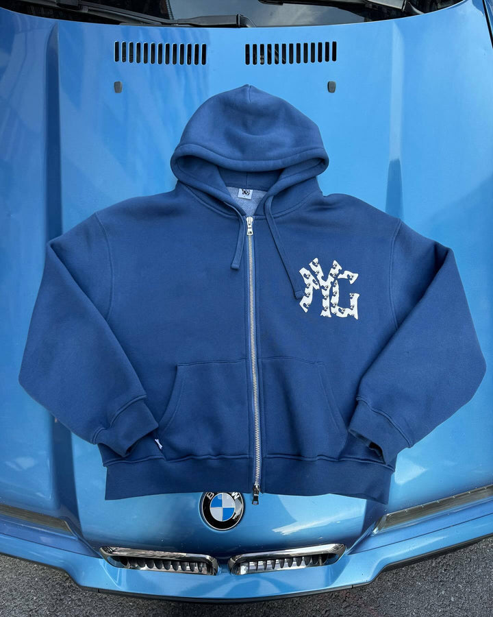 Unisex nan langt skåret hoodie sweatjakke med dobbeltsidet lynlås og logo-applikation Skovae