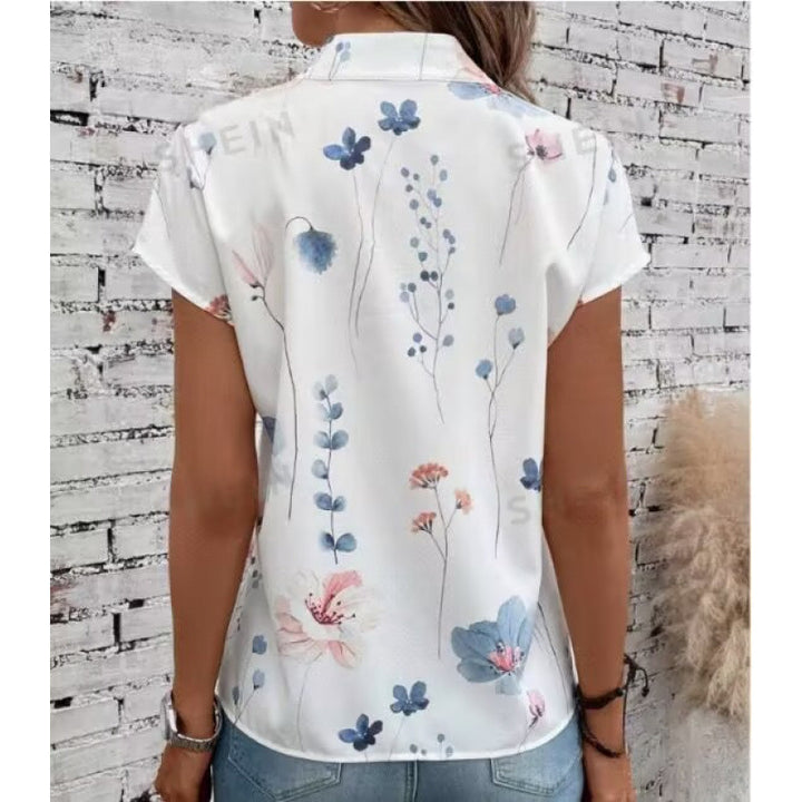 Damebluse med floraltryk og knapdetalje med korte ærmer Stilla