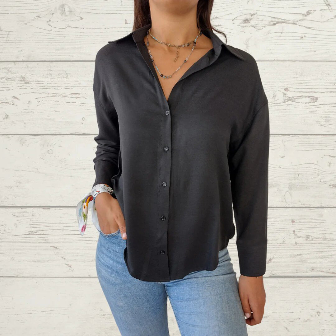 Dame moderne bluse med skinnende stof Stilla