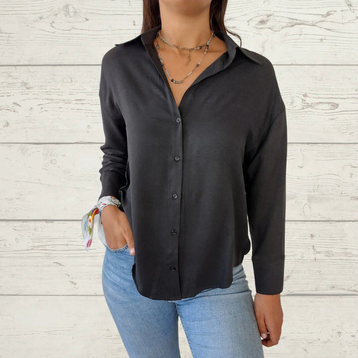 Dame moderne bluse med skinnende stof Stilla